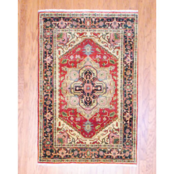 Indo Hand-knotted Heriz Red Wool Rug (4' x 6')